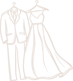 Un traje y un vestido de fiesta colgados